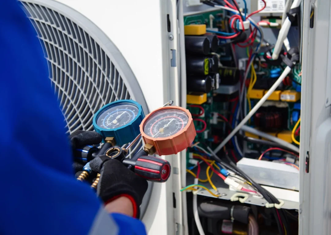 An engineer testing a commercial HVAC system.